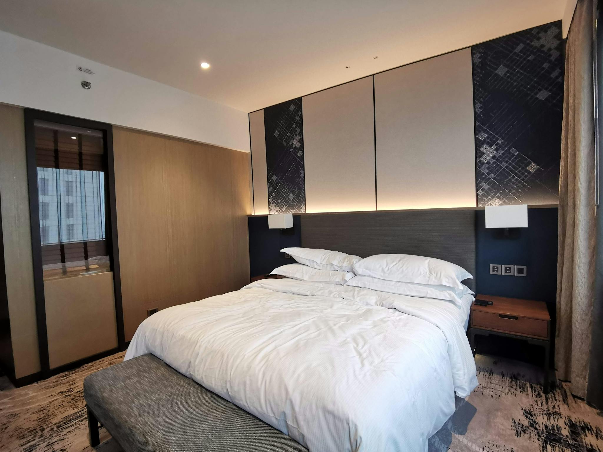 A Sleek And Modern Hotel Room Interior