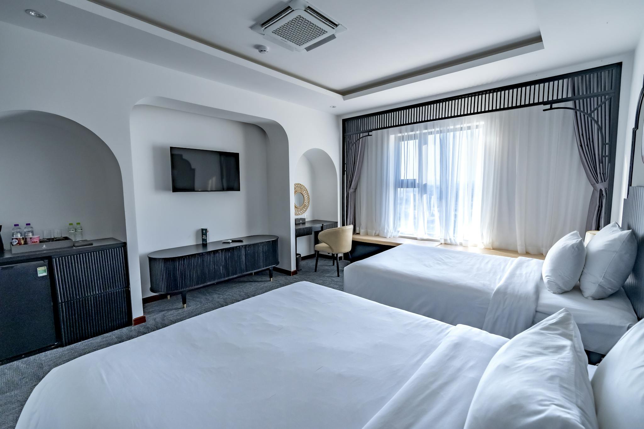 Spacious Modern Hotel Room Featuring Two Beds